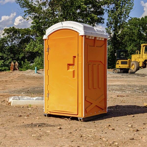 how often are the portable restrooms cleaned and serviced during a rental period in Clara City